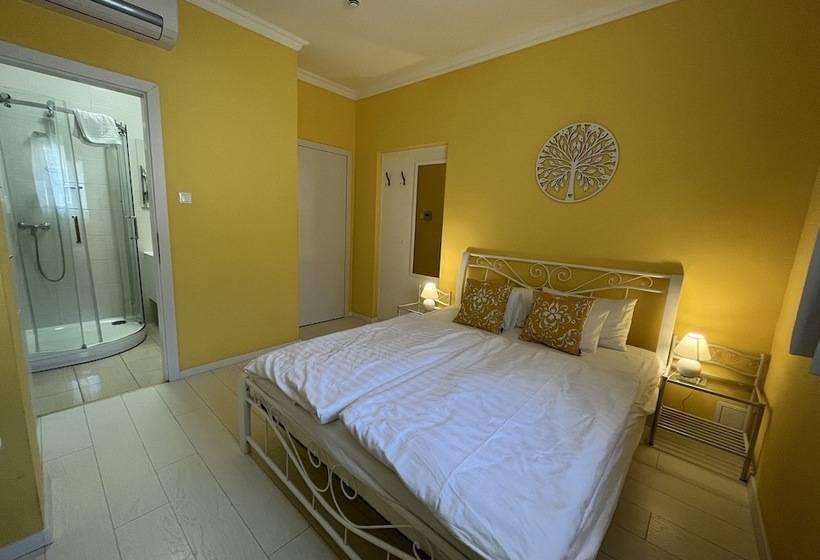 Отель Camille Apartments