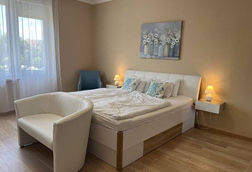 Отель Camille Apartments