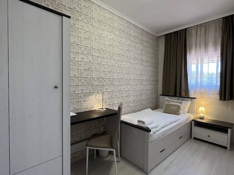 Отель Camille Apartments