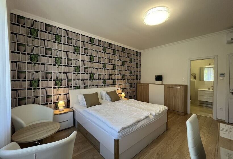 Отель Camille Apartments