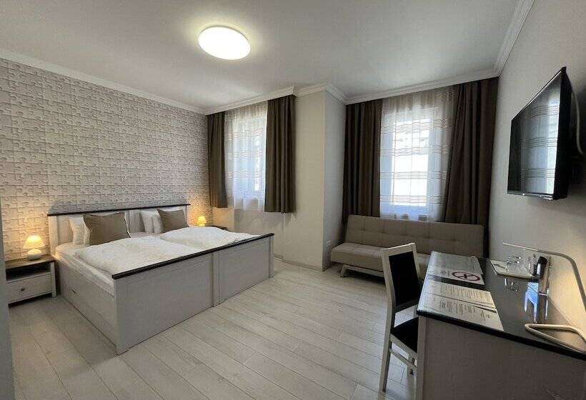 Отель Camille Apartments