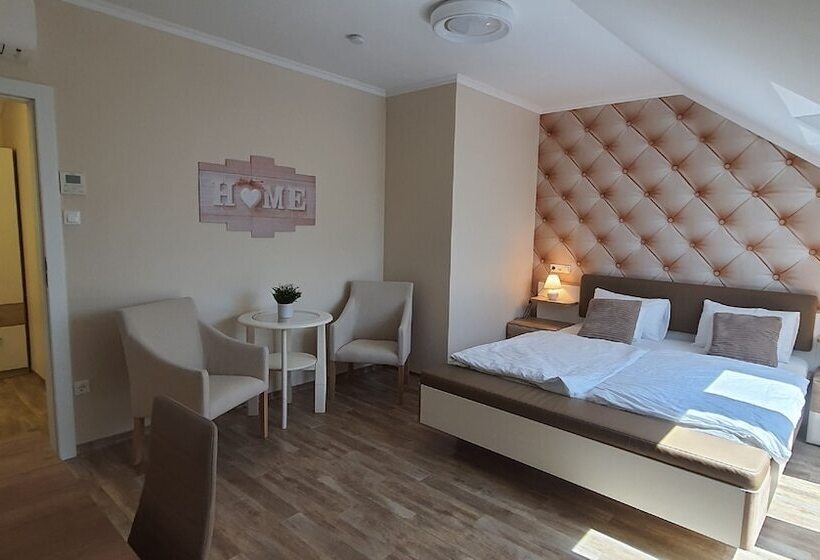 Отель Camille Apartments