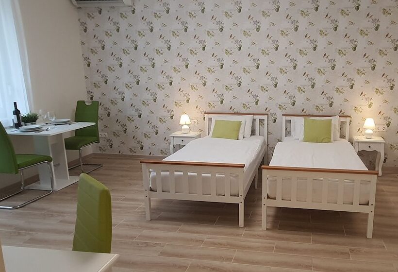 Отель Camille Apartments