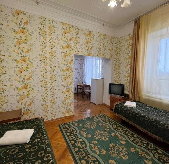 هتل 2 х комнатный номер с 4 кроватями