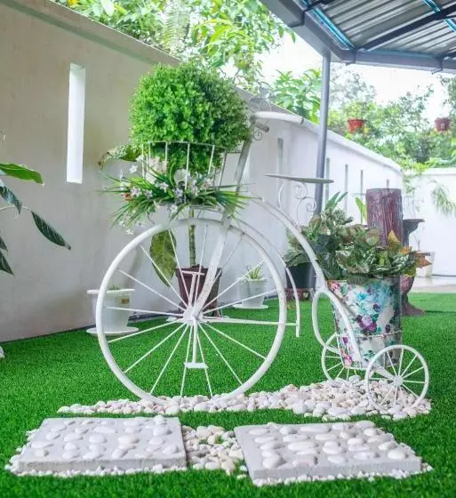 Hotelli Qiu S Event House Deluxe Room