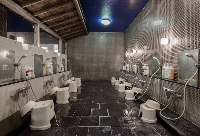 Отель Izukogen Wanwan Paradise Condominium