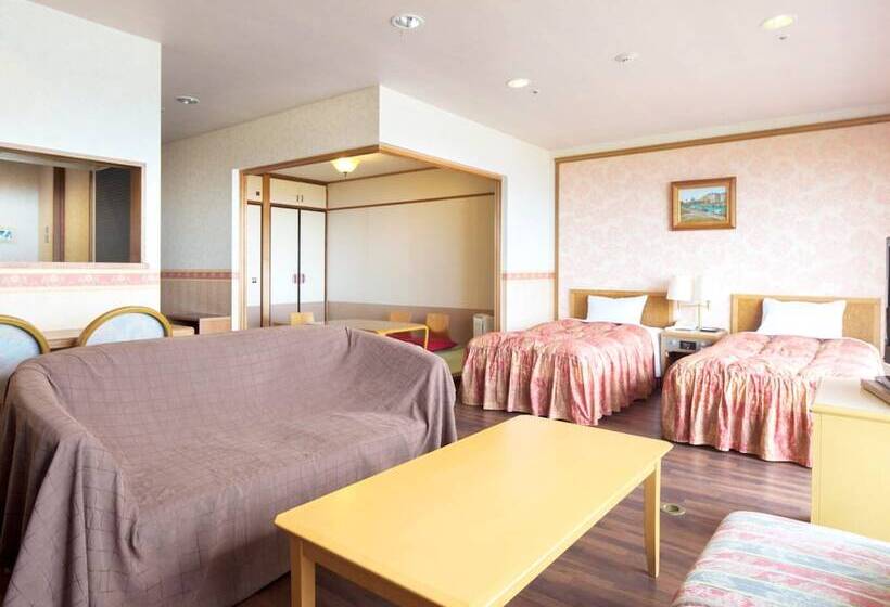 Отель Izukogen Wanwan Paradise Condominium