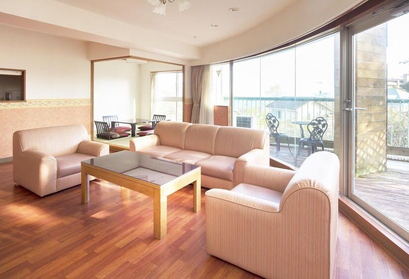 Отель Izukogen Wanwan Paradise Condominium