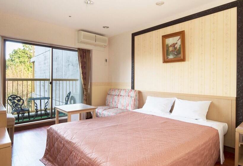 Отель Izukogen Wanwan Paradise Condominium