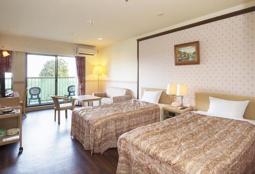 Отель Izukogen Wanwan Paradise Condominium