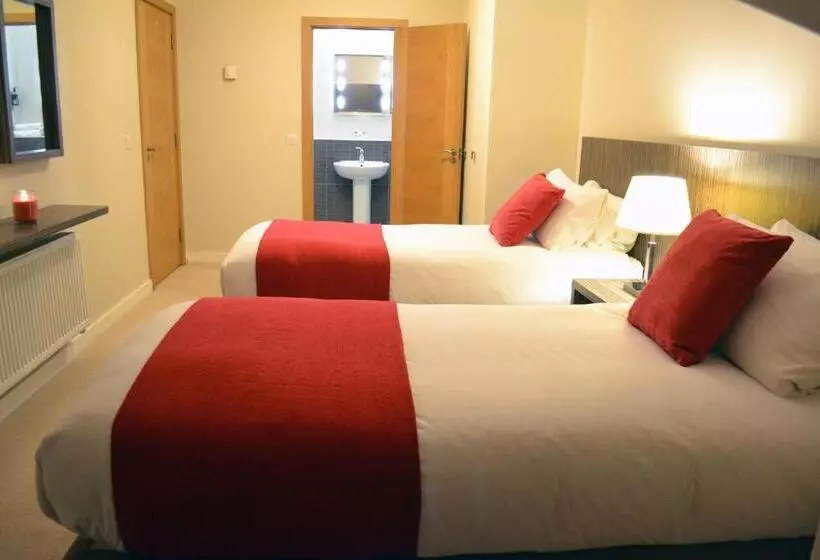 ホテル Carrick Plaza Suites And Apartments
