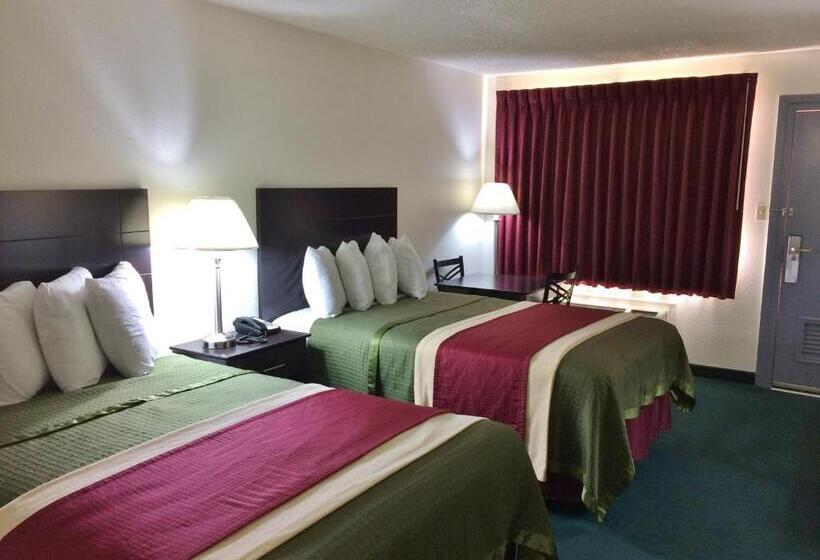 فندق على الطريق Travel Inn & Suites