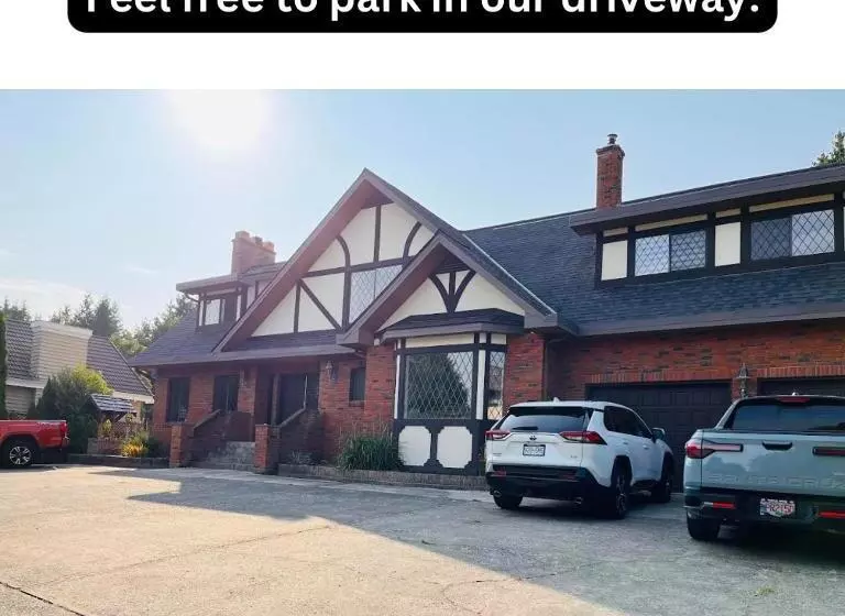 ベッドアンドブレックファースト Oceanside Manor   Fancy Room   Golf Course & Beach View