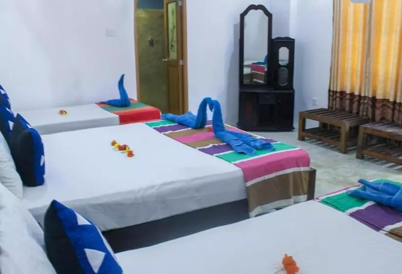 تختخواب و صبحانه Lathika Homes