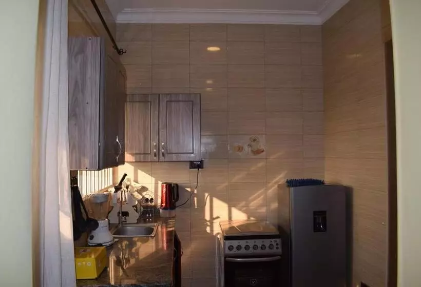 تختخواب و صبحانه Kyanja Luxury Suites