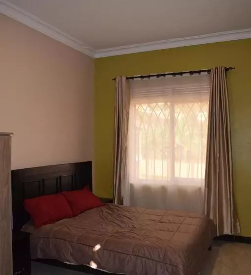 تختخواب و صبحانه Kyanja Luxury Suites