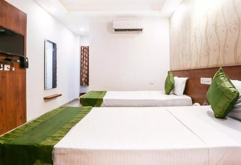 Hotelli Treebo Comforts Inn, University Road Deralakatte