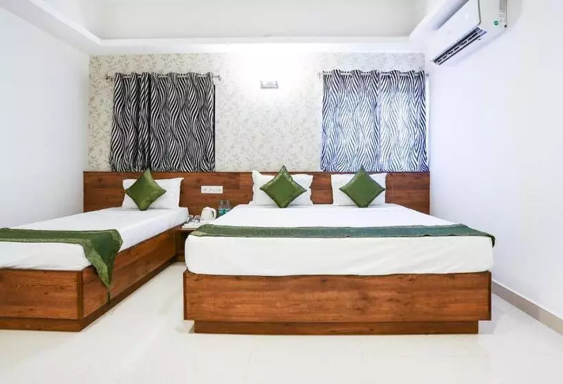 Hotelli Treebo Comforts Inn, University Road Deralakatte