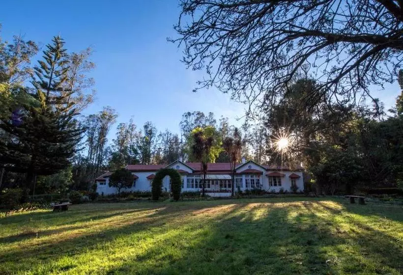 Saffronstays Milton Abbott Estate   2br Colonial Era Bungalow With Garden, Golf Course Views & Bonfi