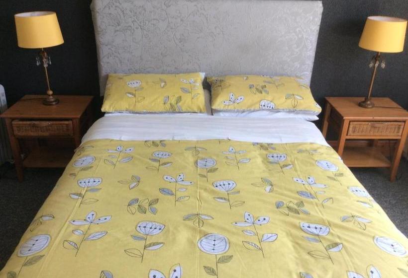 مبيت وإفطار Coach House Suites