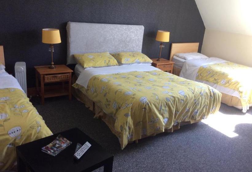 مبيت وإفطار Coach House Suites