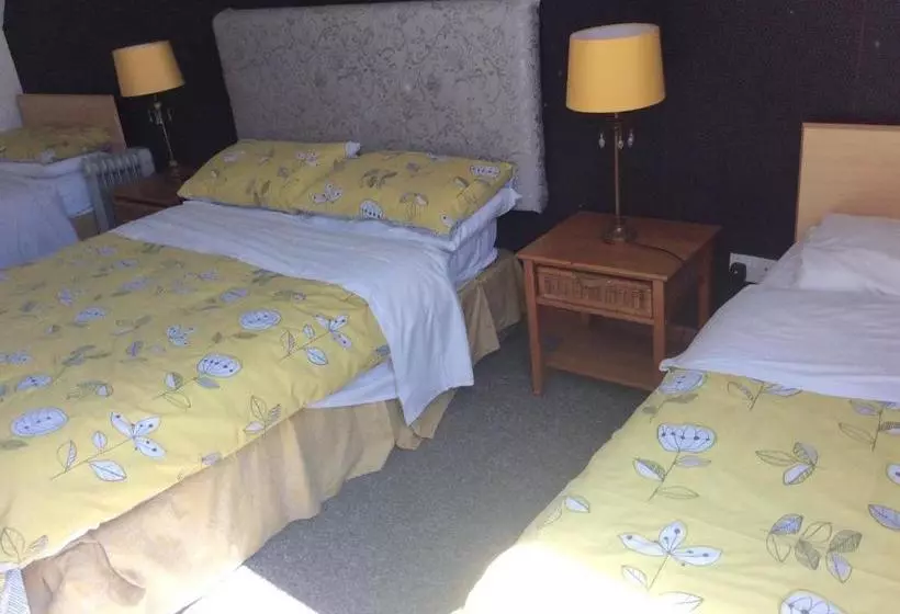 تختخواب و صبحانه Coach House Suites