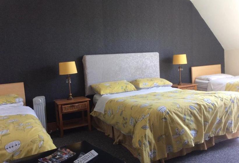 مبيت وإفطار Coach House Suites