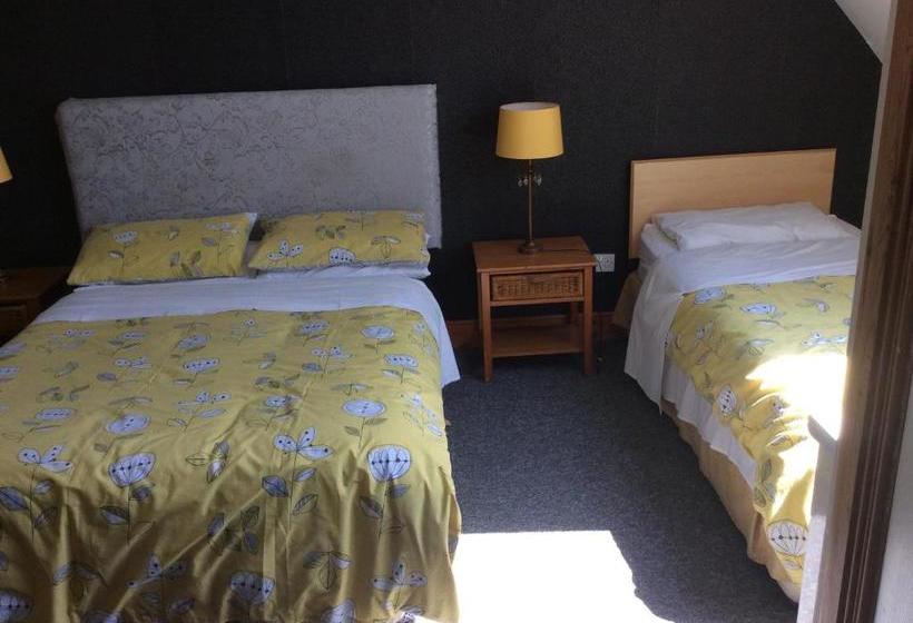 مبيت وإفطار Coach House Suites