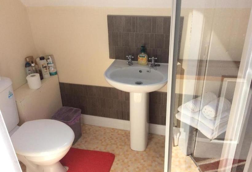 مبيت وإفطار Coach House Suites