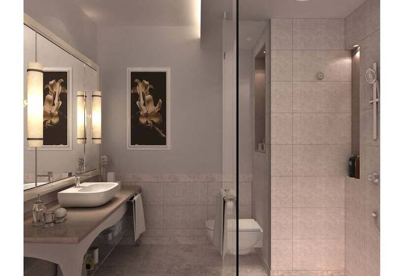 Отель Singhania Sarovar Portico