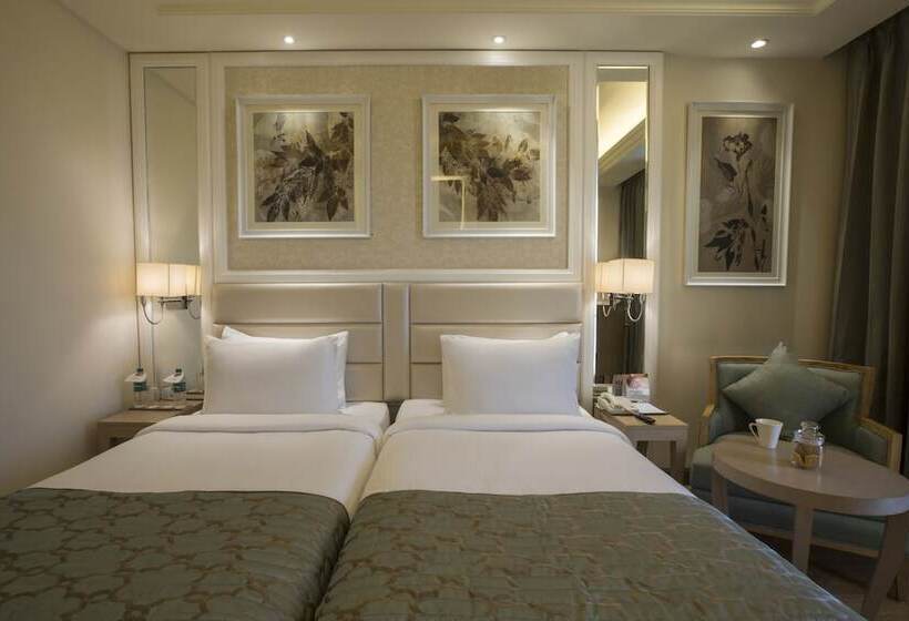 Отель Singhania Sarovar Portico