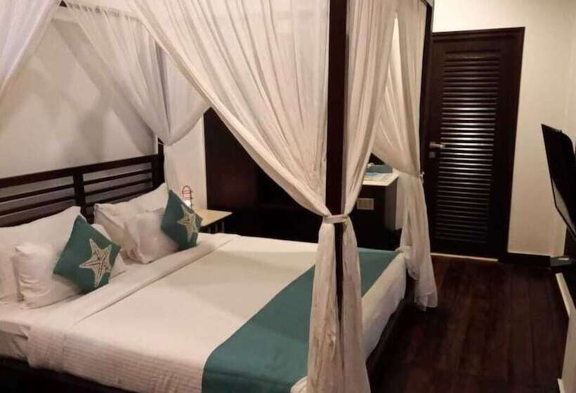 Hotell Sinq Beach Morjim