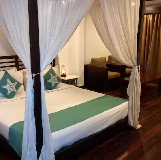 Hotell Sinq Beach Morjim