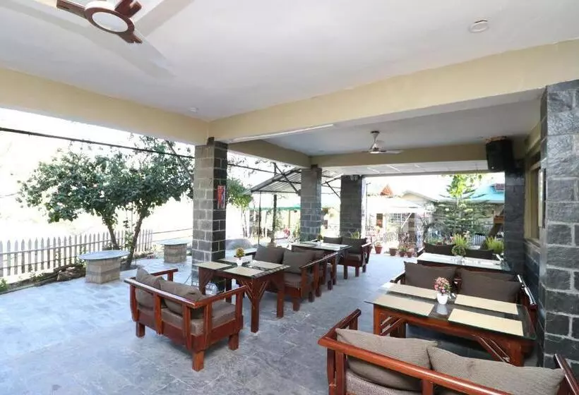 ペンション Capital O Nandini Homestay