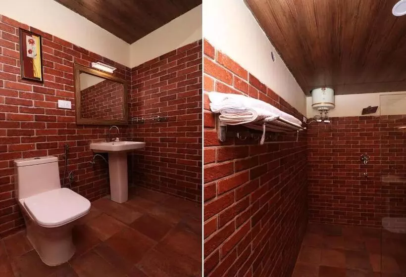 ペンション Capital O Nandini Homestay