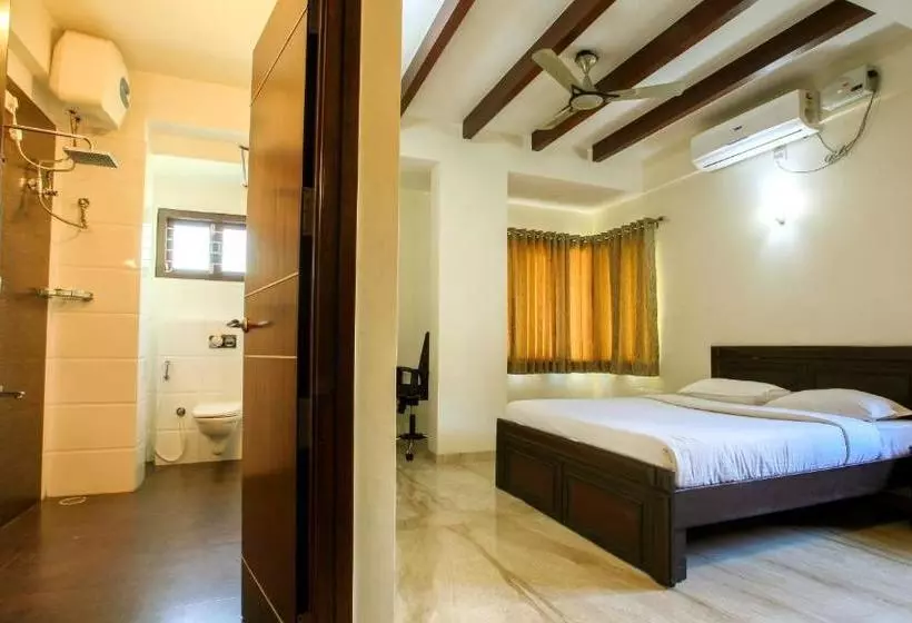ホテル Falcon Suites Yelahanka New Town