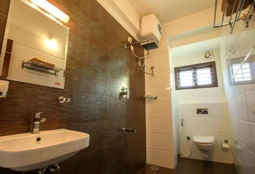 ホテル Falcon Suites Yelahanka New Town