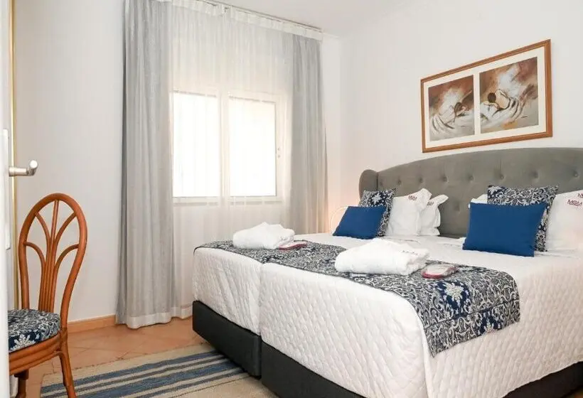 Sunflower Apartments by Delilah Collection