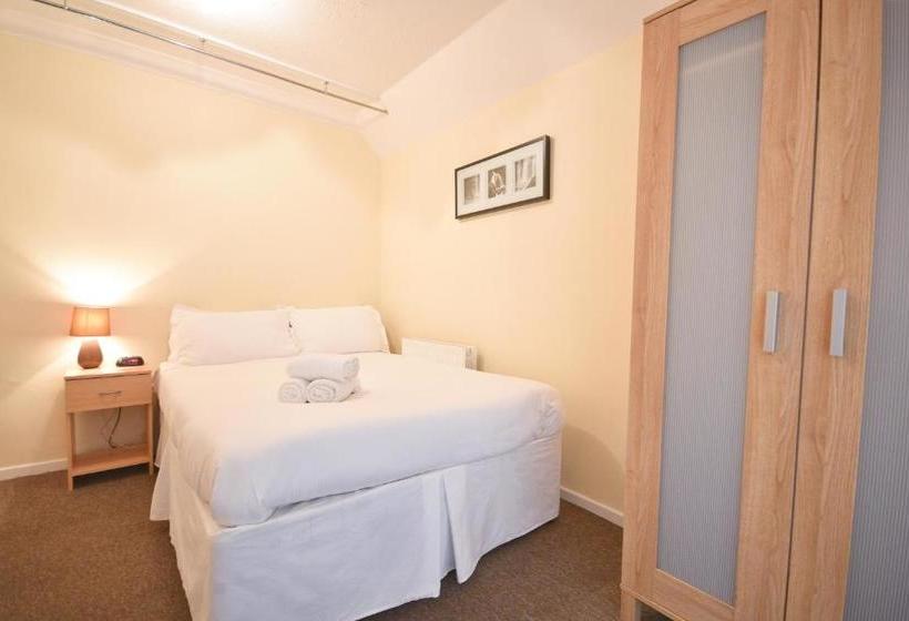 بنسيون Town Or Country Captains House