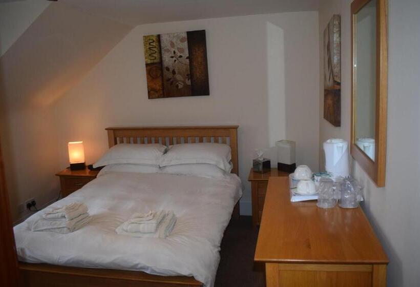 호스텔 Cheers Cafe Bar & Tavern