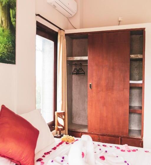 Пансион Umah Tikari Guesthouse