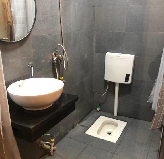 פנסיון Fenghuang Little Bear Family Guest House