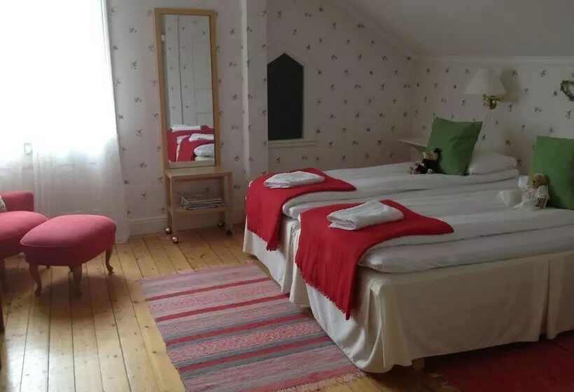 Majatalo L Floras Trädgård