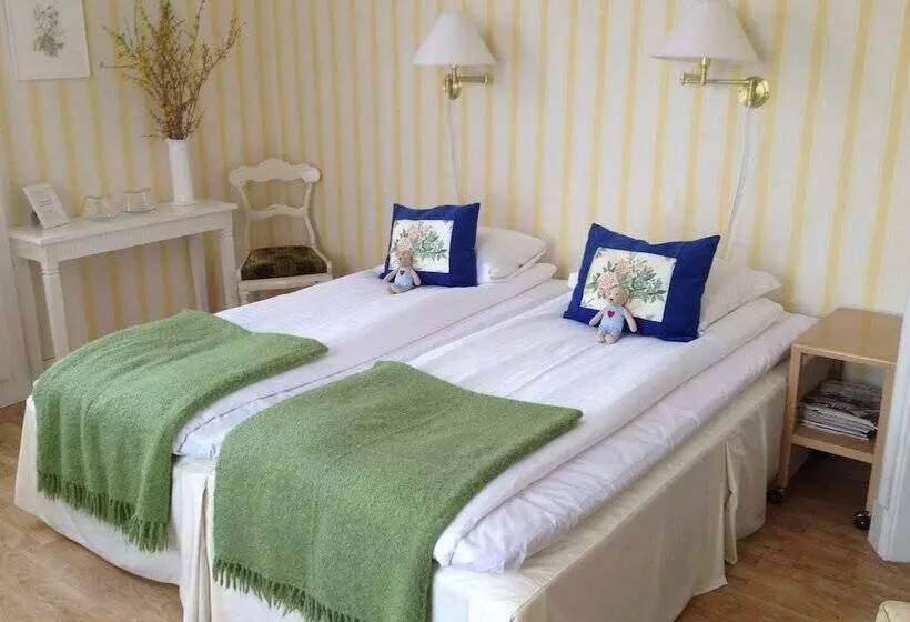 Majatalo L Floras Trädgård