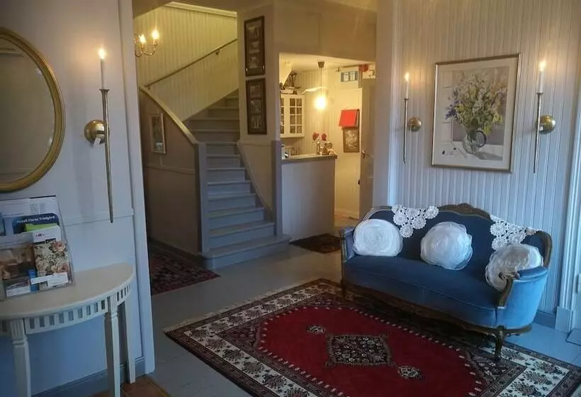 Majatalo L Floras Trädgård