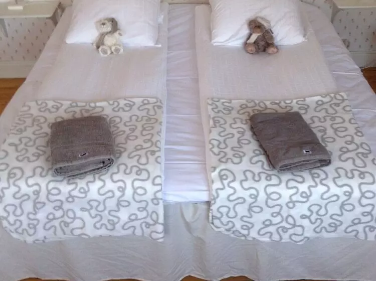 Majatalo L Floras Trädgård