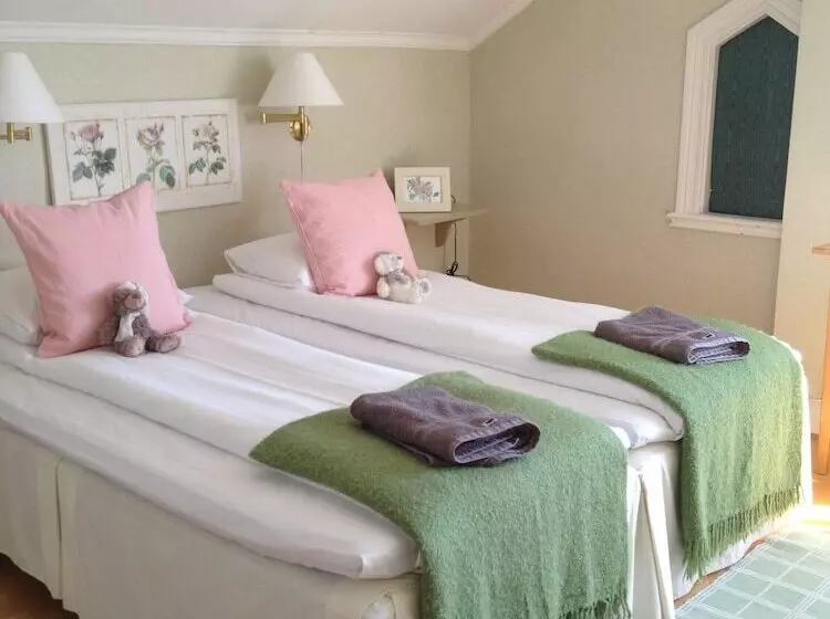 Majatalo L Floras Trädgård