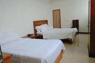 펜션 Pesona Bali Room And Restaurant