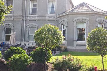 ツーリストアパートメント Faithlegg Lodge