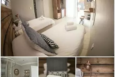 پانسیون Touching Senses Garden Cottages